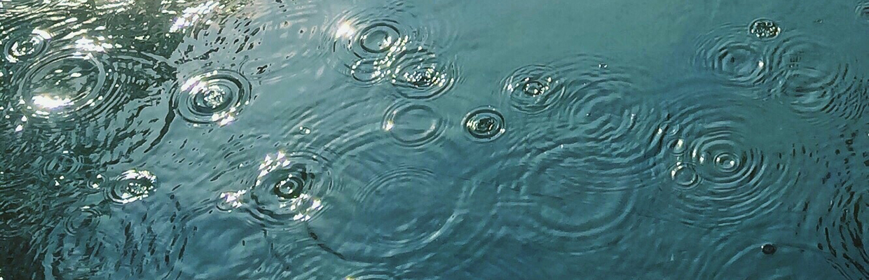 Raindrops in water