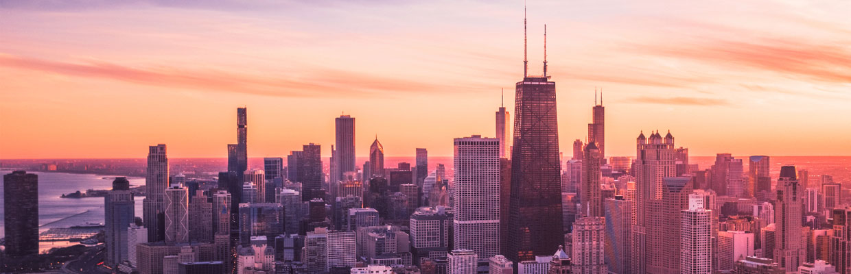 Aerial Dramatic View of Downtown Chicago at Sunset - Lake Shore Drive