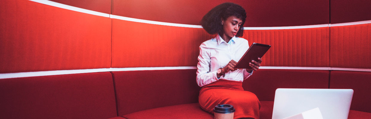 Woman Holding a Tablet