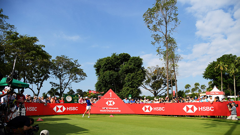 Women playing golf at an HSBC event