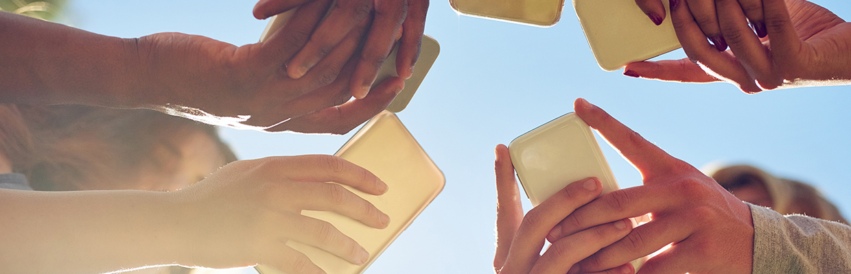 Teenagers hands with mobile phones