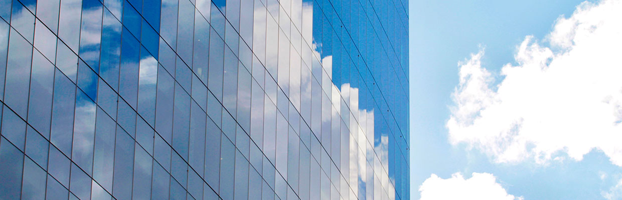 Blue sky reflection in a high rise building