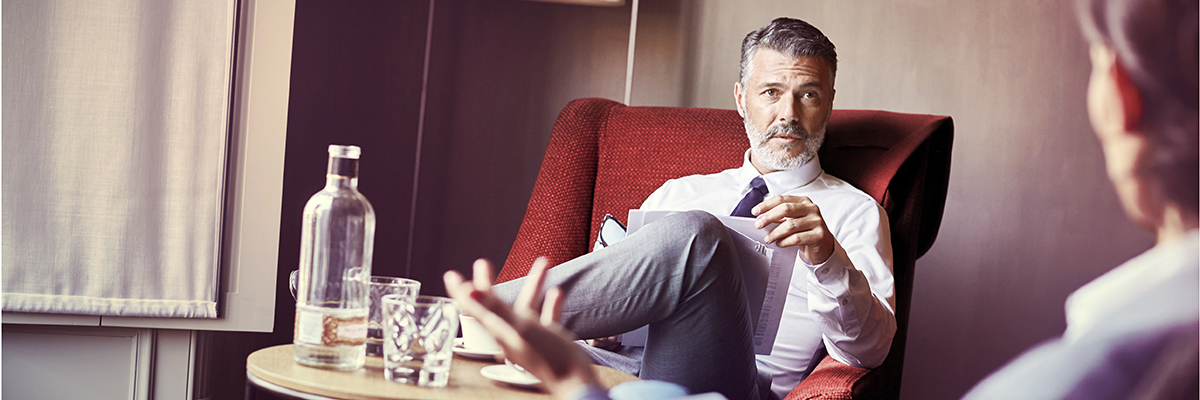 Businessman having drinks