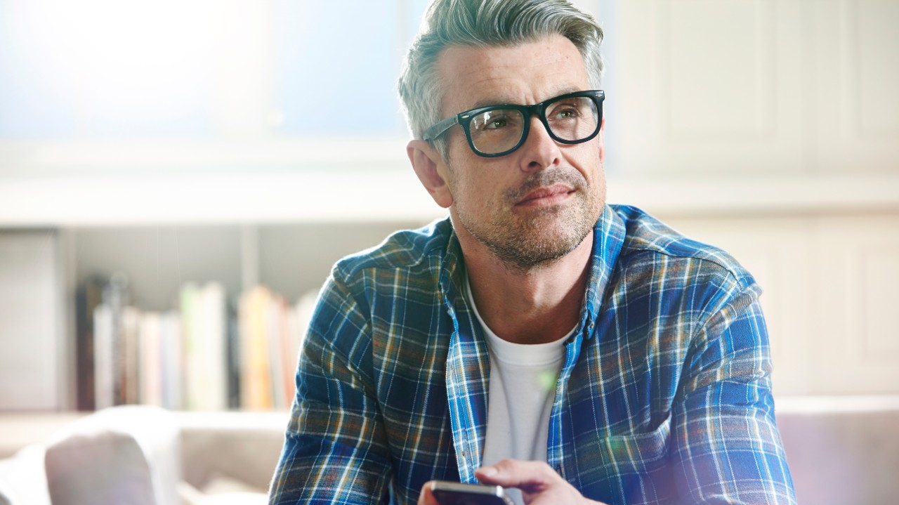  Man holding a remote